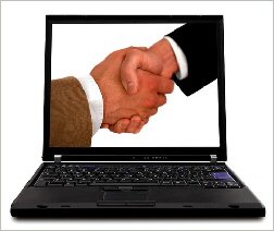 Men-shaking-hands-on-computer-screen Internet Marketing Agency